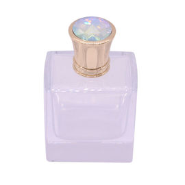 Métal qui respecte l'environnement de parfum de couleur d'OEM d'ODM de couvercles faits sur commande de bouteille avec la pierre