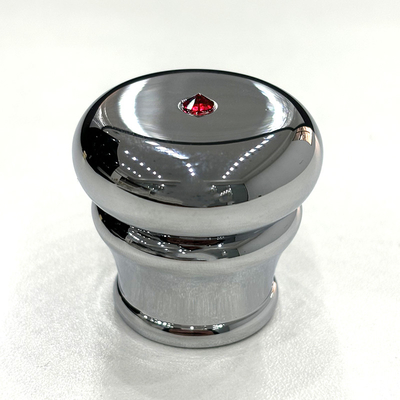 Un couvercle de parfum Zamak élégant avec une surface brillante